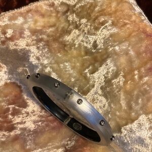 Pewter colored Alexis Bittar magnetic cuff bracelet. Lucite